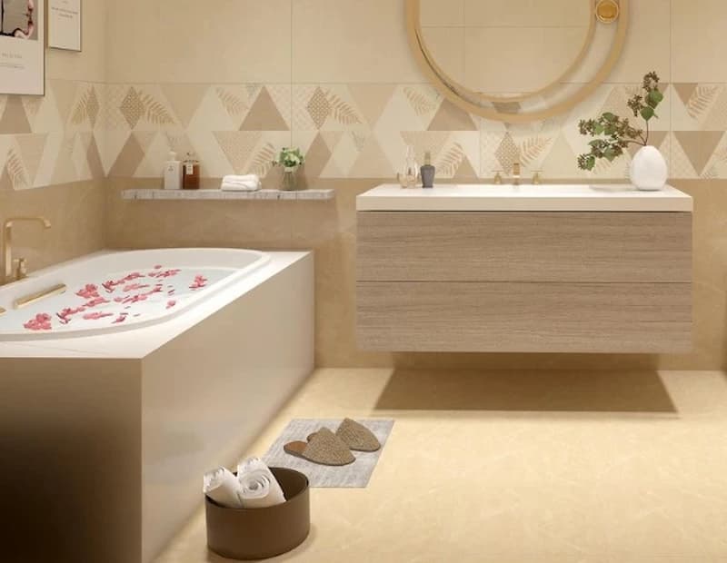 Các mẫu ốp nhà vệ sinh đẹp màu vàng mơ vân đá nhạt tạo không gian sạch sẽ, thoáng đãng