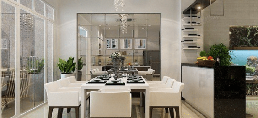 Bạn có thể đặt gương đối diện bàn ăn, giúp mở rộng không gian phòng bếp 
