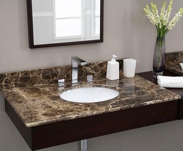 Chậu rửa mặt bàn đá có thể giúp không gian nhà tắm thêm thoáng đãng và sang trọng